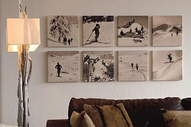 Bilder in schwarz/weiß in der Kitzhof Suite als Hommage an die alten Zeiten